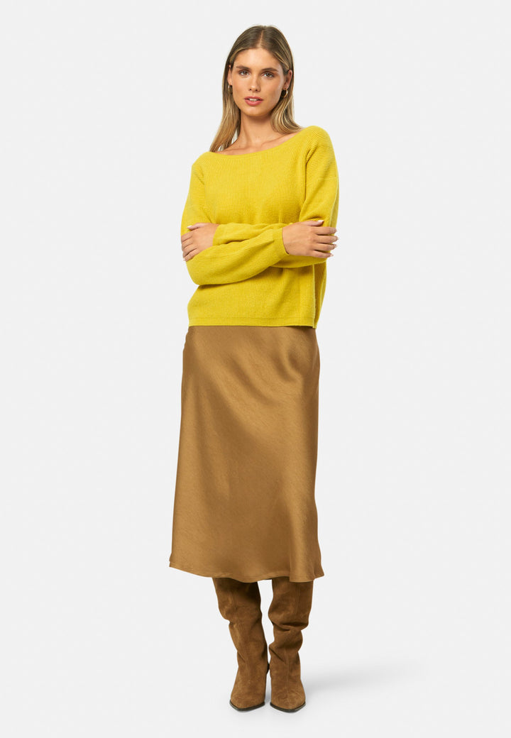 A versatile, reversible cardigan you can wear buttoned at the front or back, or pair with the matching Marlena top. Spun from pure cashmere with a plush, cloud-soft handle, it features a neat crew neckline, dropped shoulders and an easy, hip-skimming fit finished with fine rib trims.