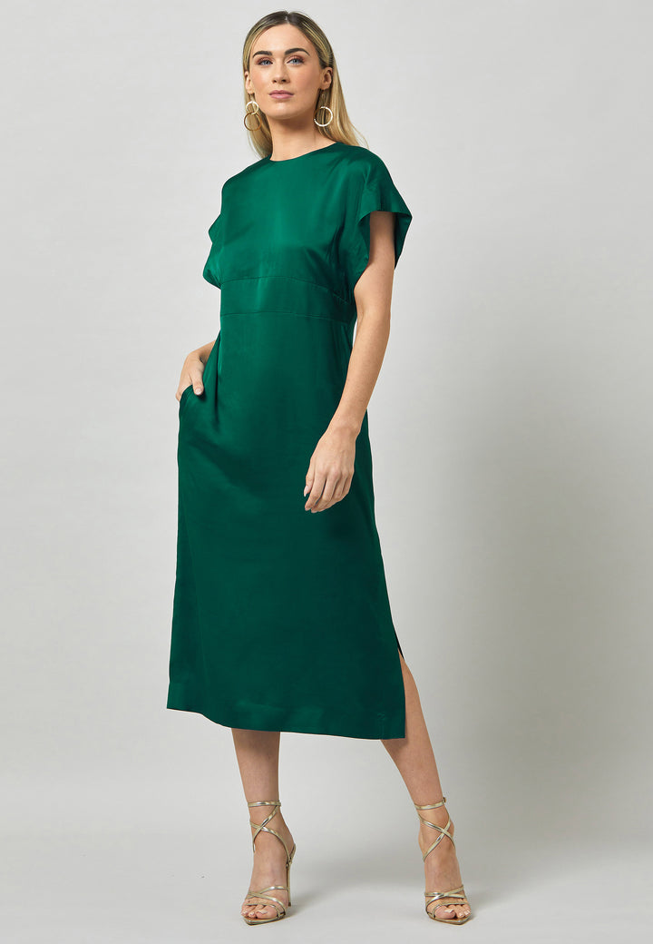 Evening edits get upgraded with the Shiv dress. Crafted in luxurious satin. An easy-fitting silhouette with a v-neckline. Skirt falls to the mid-calf and side seam slit adds a sense of allure. Features handy Side seam pockets. Engineered with an elegant key-hole back neck detail. Simply add heels and a clutch for a look that turns heads at any event. Classic Occasionwear, modernized.