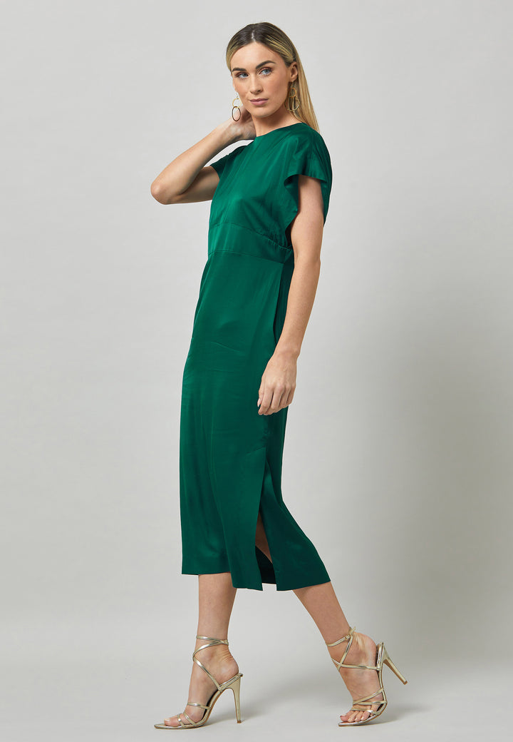 Evening edits get upgraded with the Shiv dress. Crafted in luxurious satin. An easy-fitting silhouette with a v-neckline. Skirt falls to the mid-calf and side seam slit adds a sense of allure. Features handy Side seam pockets. Engineered with an elegant key-hole back neck detail. Simply add heels and a clutch for a look that turns heads at any event. Classic Occasionwear, modernized.