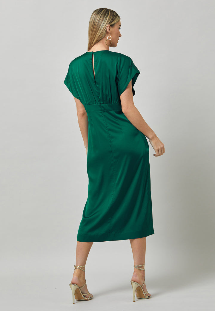 Evening edits get upgraded with the Shiv dress. Crafted in luxurious satin. An easy-fitting silhouette with a v-neckline. Skirt falls to the mid-calf and side seam slit adds a sense of allure. Features handy Side seam pockets. Engineered with an elegant key-hole back neck detail. Simply add heels and a clutch for a look that turns heads at any event. Classic Occasionwear, modernized.