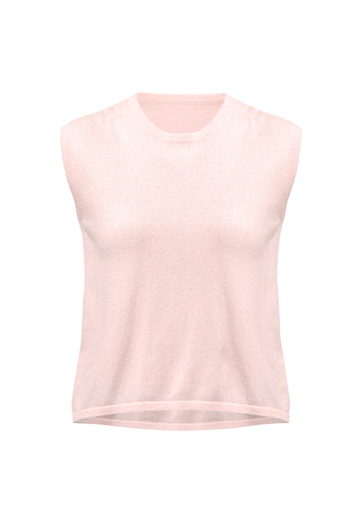 The Marlena Petal Pink Cashmere Sweater-Vest is a sleeveless round neck top that offers versatile styling options. Wear it as a simple underpinning for the matching ballet wrap to complete a coordinated look. Alternatively, layer it as a sweater vest over your favorite crisp white shirts for a stylish and contemporary outfit. Made from luxurious cashmere, the Marlena Sweater-Vest adds an extra layer of comfort and sophistication to your wardrobe.