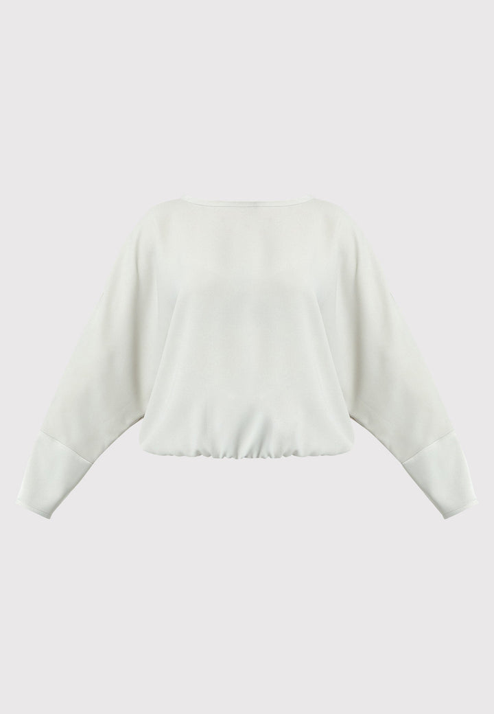 Lal, stone top in fluid satin back crepe. A relaxed fit, elastic waistband, Dropped Shoulder sleeves, and satin cuffs. Wear with the coordinating Deliliah or Imogen Pant.