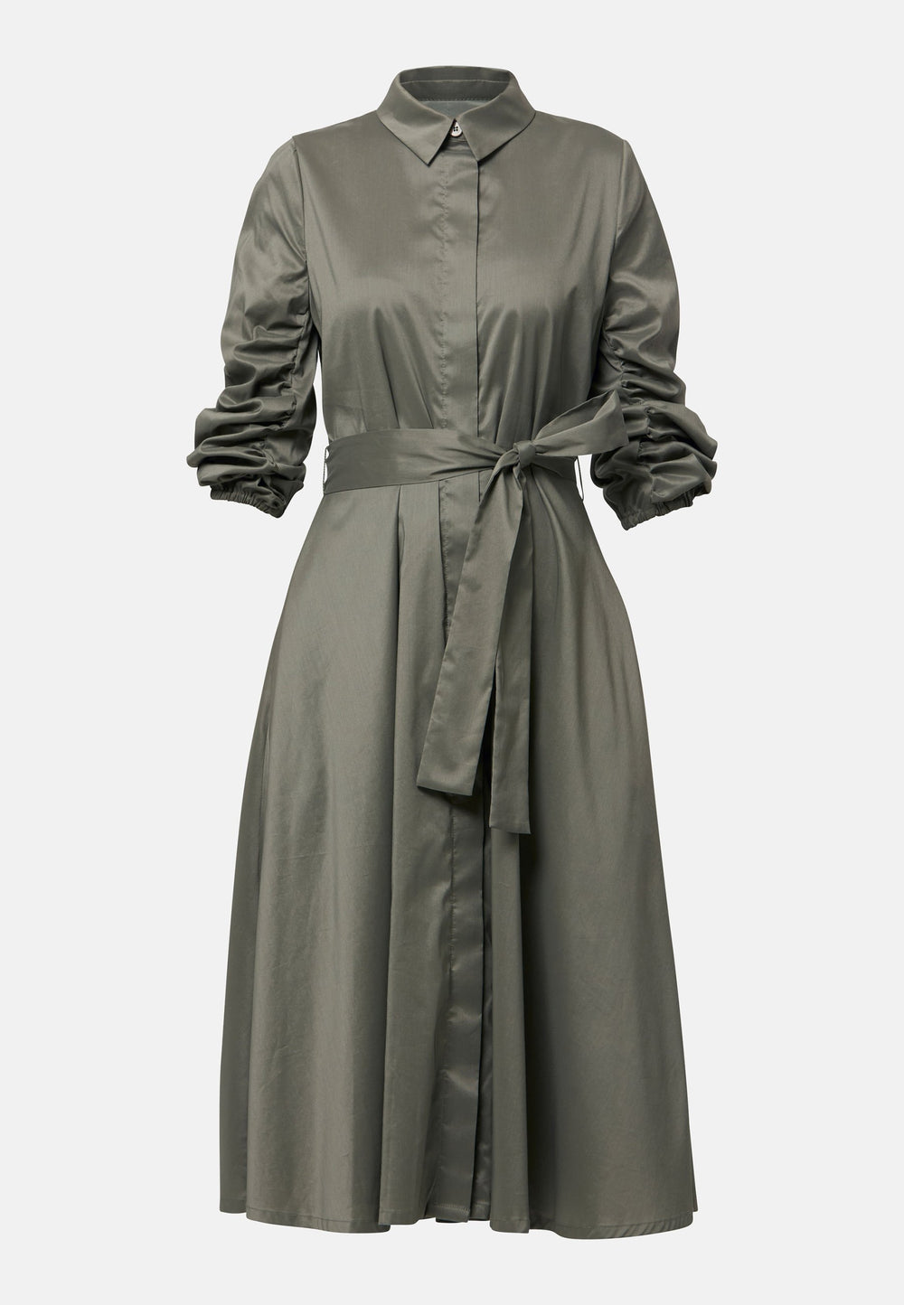 The Leah Olive midi shirt dress combines classic tailoring with a feminine touch. Featuring a button-down front and ruched three-quarter length sleeves, it offers versatility and style. The detachable tie belt cinches the waist, while the gently flared skirt provides a flattering silhouette with essential side seam pockets.