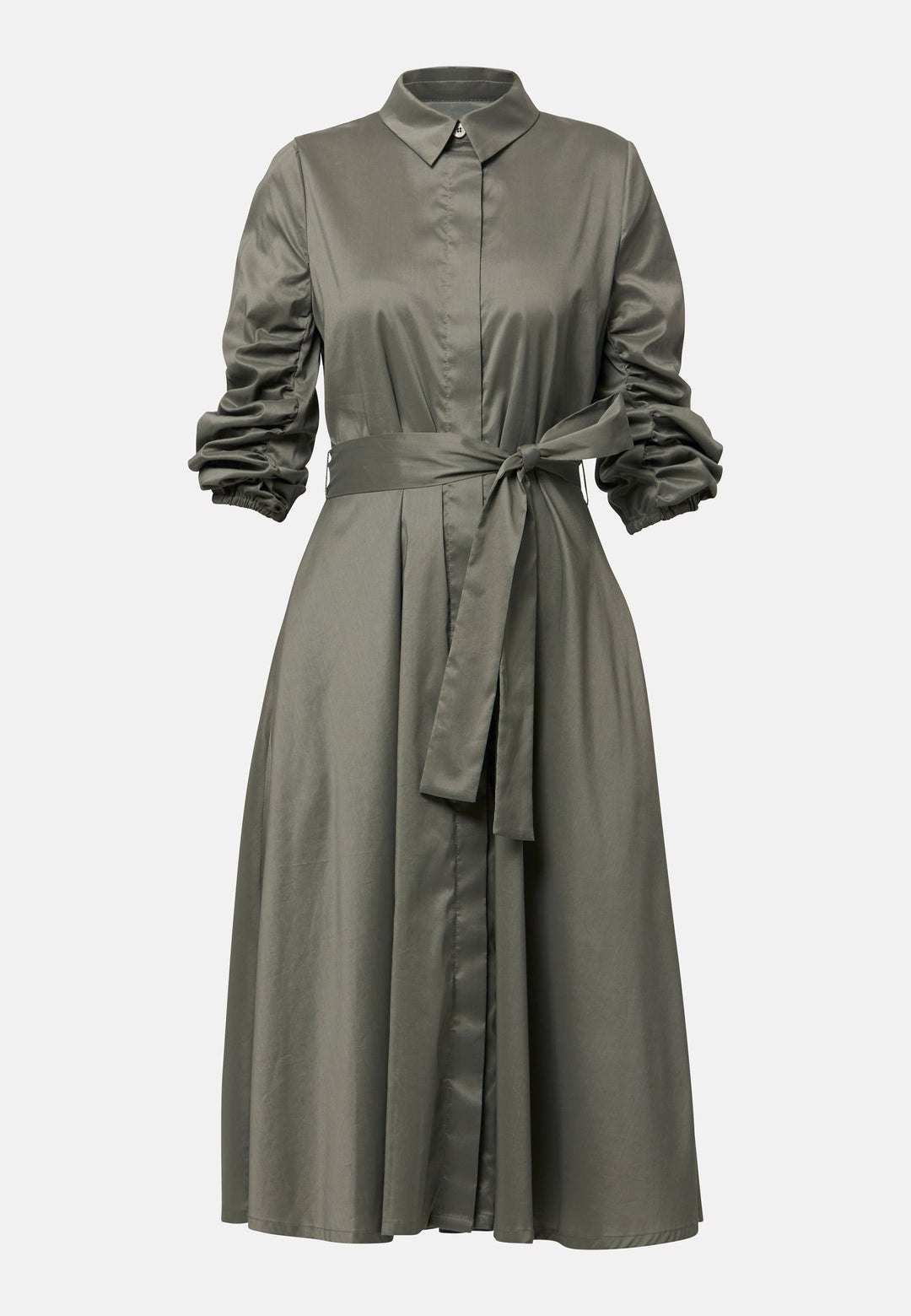 The Leah Olive midi shirt dress combines classic tailoring with a feminine touch. Featuring a button-down front and ruched three-quarter length sleeves, it offers versatility and style. The detachable tie belt cinches the waist, while the gently flared skirt provides a flattering silhouette with essential side seam pockets.