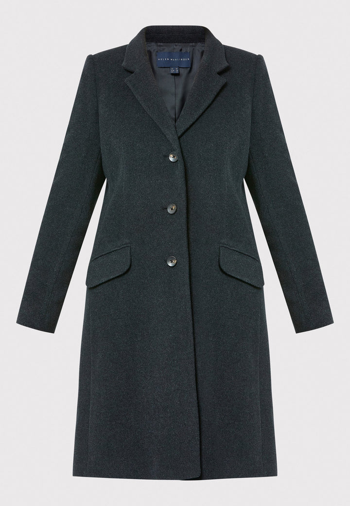 The Leighton charcoal grey coat is crafted from a luxurious wool and cashmere melton blend. Expertly crafted, this knee-length coat offers both warmth and sophistication. Drawing inspiration from refined men's tailoring, it showcases a tidy collar and revere design. With a three-button finish and practical pockets, this coat effortlessly combines functionality with style. Elevate your outerwear collection with this versatile and classic piece that will ensure you stay chic and cozy throughout the winter sea