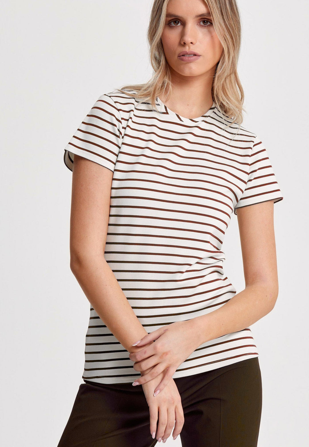 Our best-selling take on a classic white tee. Luxe stretch jersey and a neat round neck make this one of our most revered essentials. Now available in a sandlewood and ecru stripe.