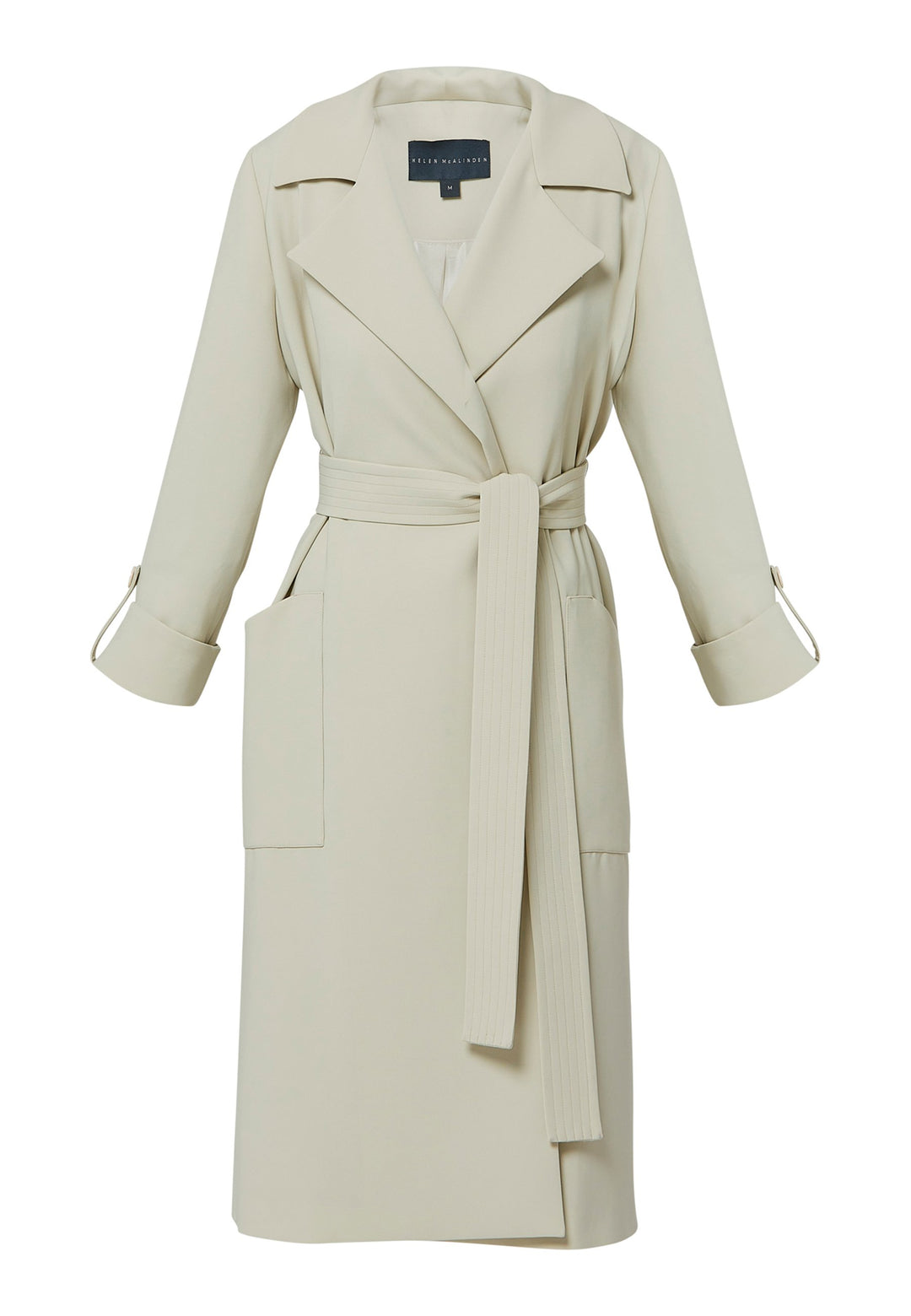 Lydiah captures the essence of sophisticated simplicity with its elegant design. This fluid trench coat features a neutral bone hue that radiates timeless appeal. It comes with a meticulously row-stitched, detachable belt that adds a touch of refinement, allowing you the flexibility to cinch it at the waist or wear it open for a relaxed look.