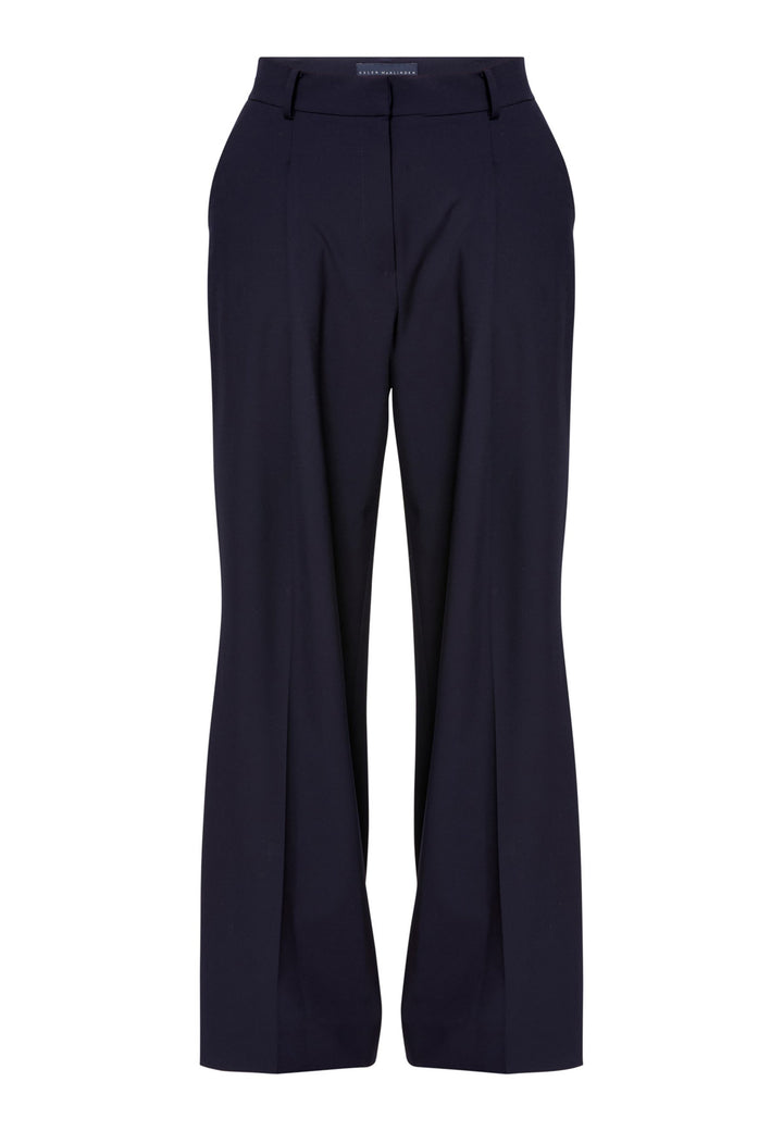 Lyra, the modern wide-leg trouser. Tailored with a natural waist, soft front pleats and sharp pressed creases. Full-length and fluid for an elongating line, with side pockets, belt loops and neat back welt pockets. Wear with the Darcie blazer for the coordinating suit, or dress down with a simple knit.