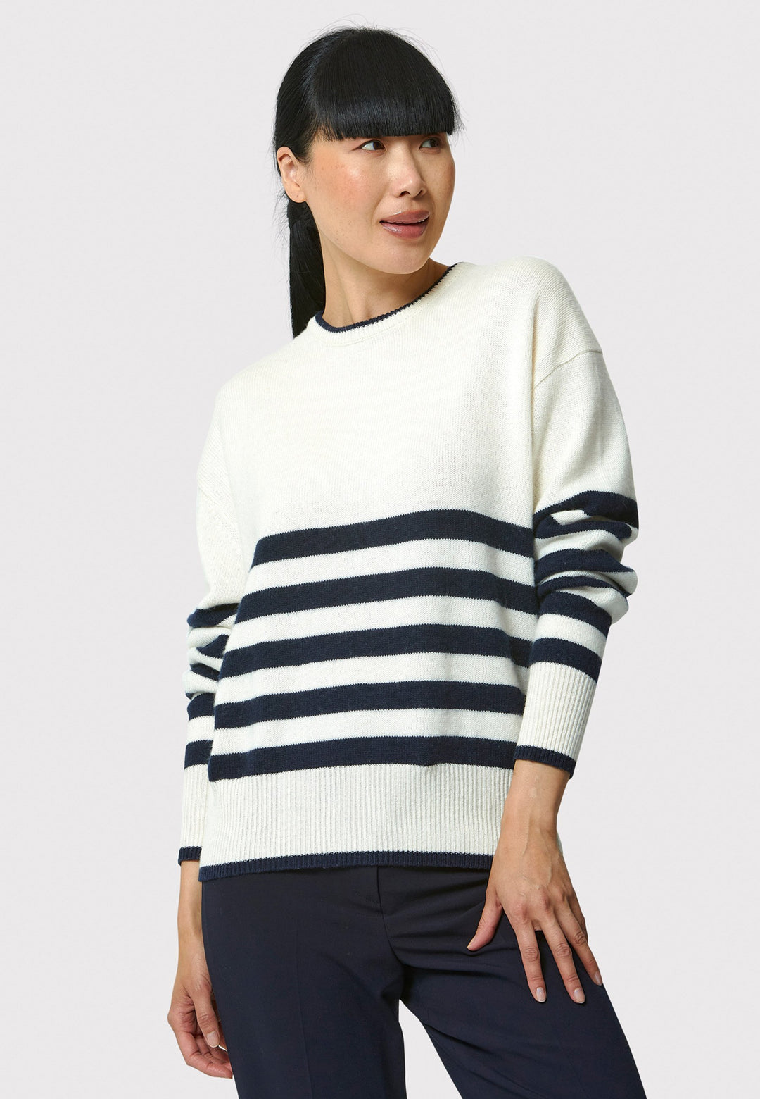 The Marine Stripe Sweater is a luxurious blend of extra fine merino wool and cashmere, ensuring a soft and warm experience.