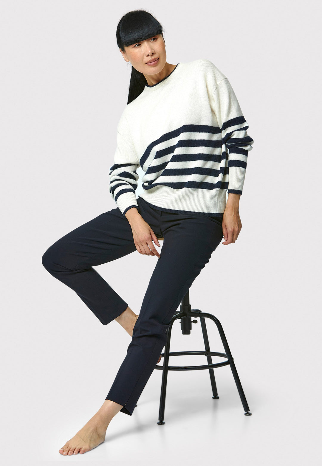 The Marine Stripe Sweater is a luxurious blend of extra fine merino wool and cashmere, ensuring a soft and warm experience.
