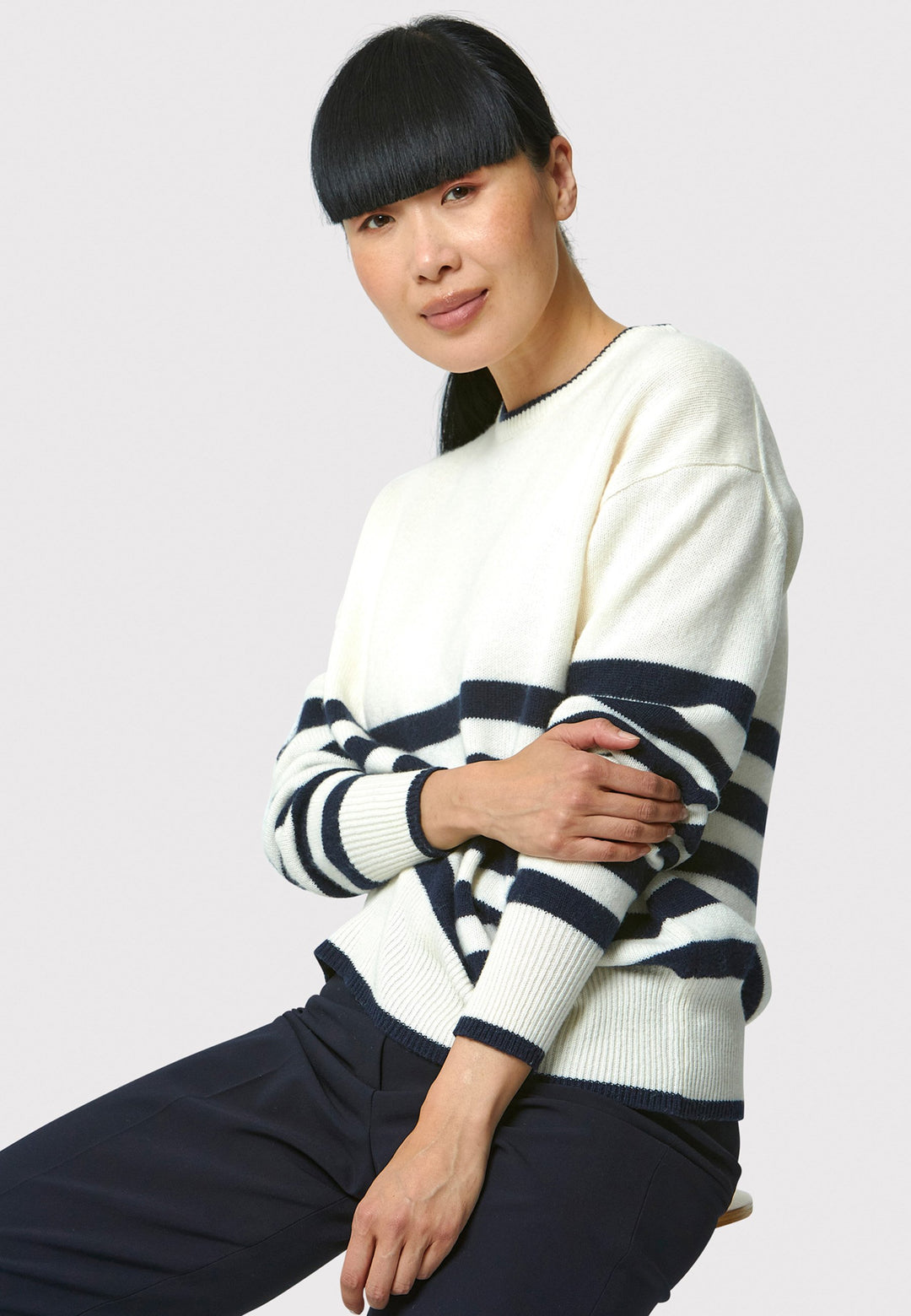 The Marine Stripe Sweater is a luxurious blend of extra fine merino wool and cashmere, ensuring a soft and warm experience.