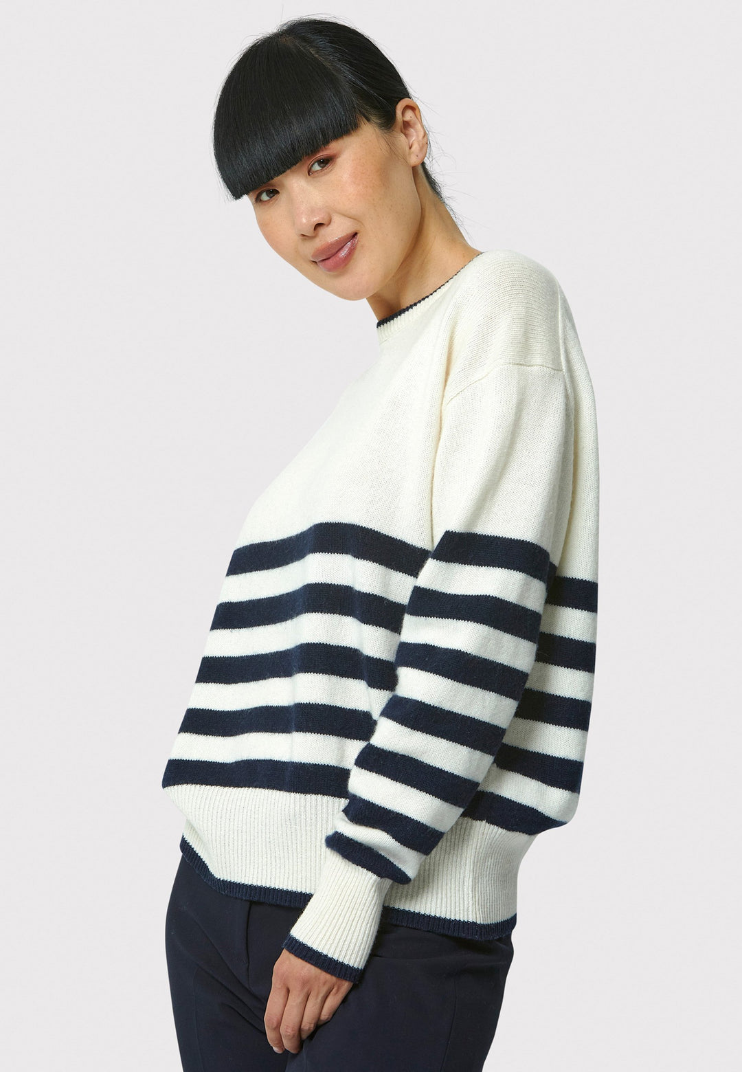 The Marine Stripe Sweater is a luxurious blend of extra fine merino wool and cashmere, ensuring a soft and warm experience.