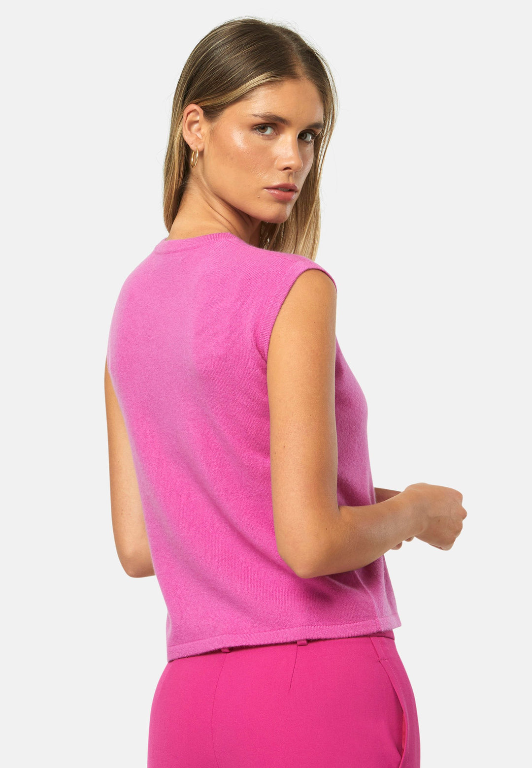 The statement sleeveless knit. Spun from pure cashmere with a cloud-soft handle, it has a neat crew neckline, clean armholes and a waist-skimming straight fit. Lightweight yet warm, it slips under blazers or wears solo with high-rise denim.