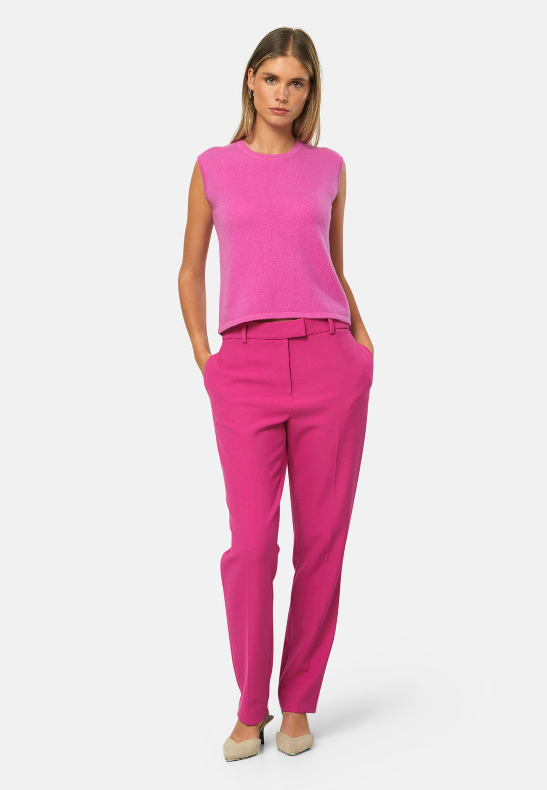 The statement sleeveless knit. Spun from pure cashmere with a cloud-soft handle, it has a neat crew neckline, clean armholes and a waist-skimming straight fit. Lightweight yet warm, it slips under blazers or wears solo with high-rise denim.
