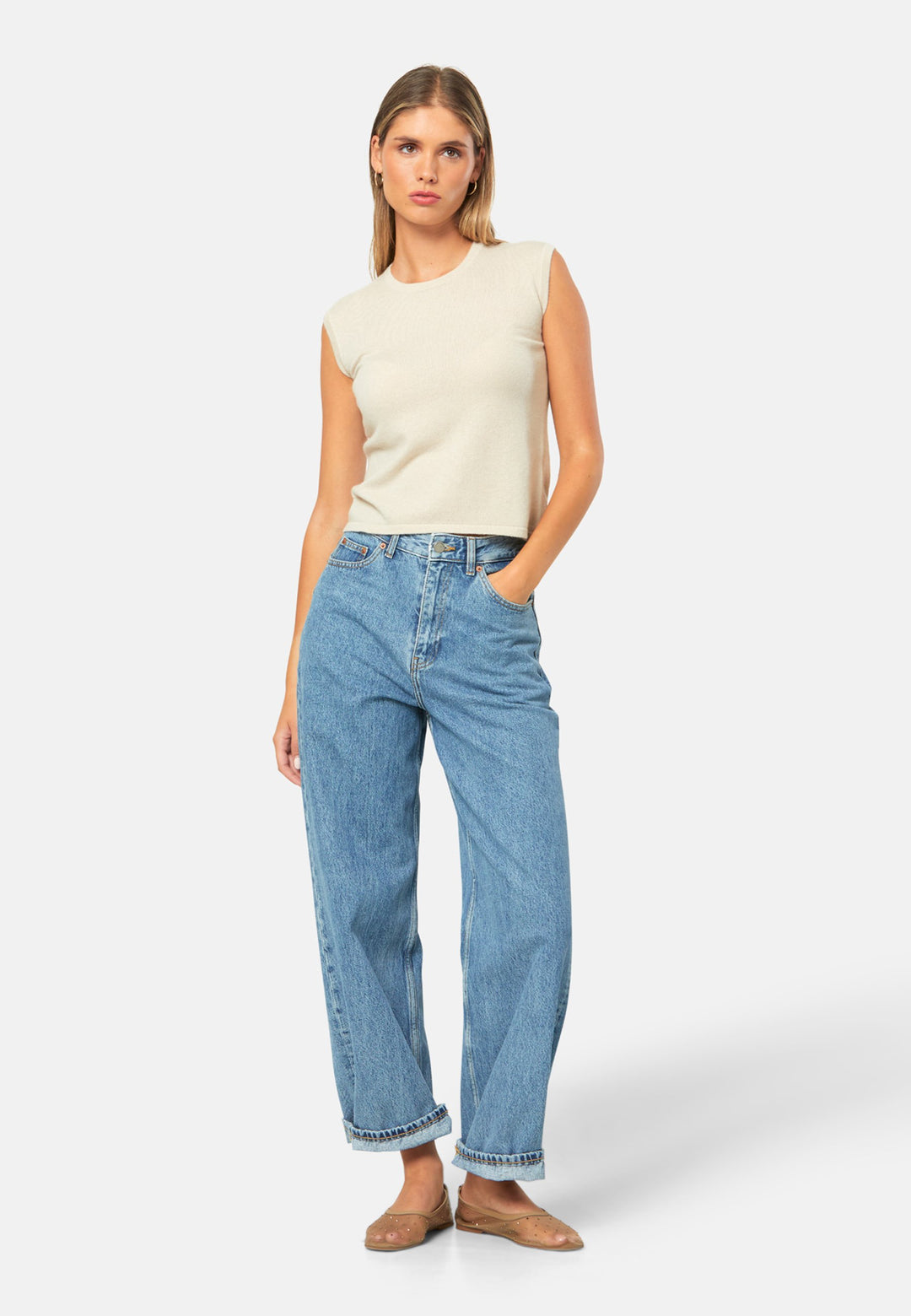 The statement sleeveless knit. Spun from pure cashmere with a cloud-soft handle, it has a neat crew neckline, clean armholes and a waist-skimming straight fit. Lightweight yet warm, it slips under blazers or wears solo with high-rise denim.
