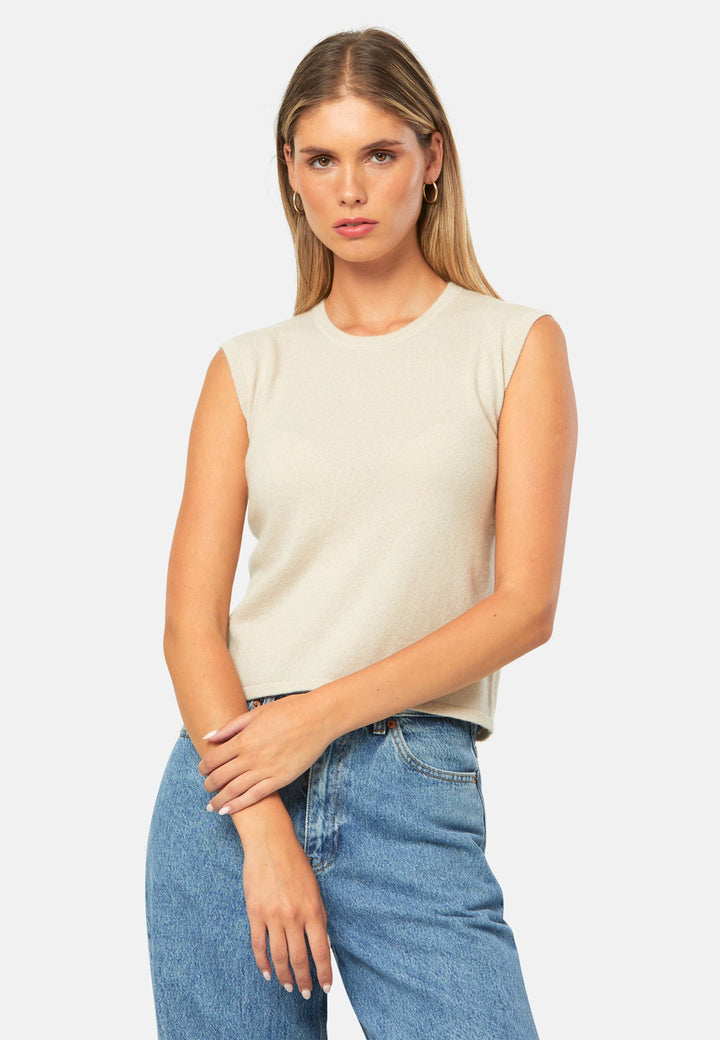 The statement sleeveless knit. Spun from pure cashmere with a cloud-soft handle, it has a neat crew neckline, clean armholes and a waist-skimming straight fit. Lightweight yet warm, it slips under blazers or wears solo with high-rise denim.