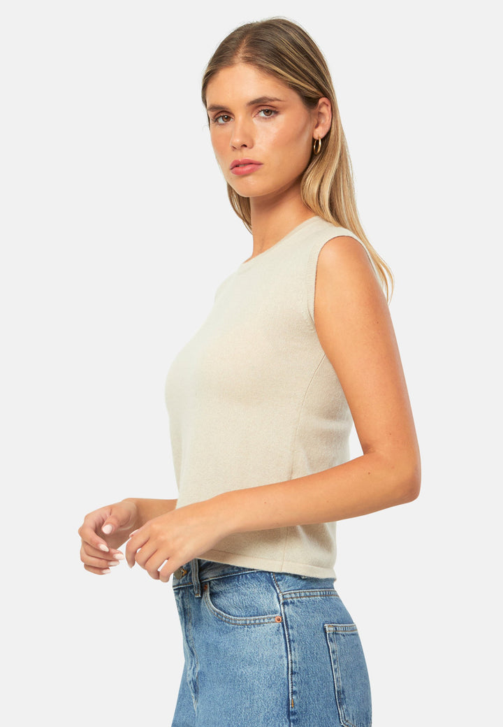 The statement sleeveless knit. Spun from pure cashmere with a cloud-soft handle, it has a neat crew neckline, clean armholes and a waist-skimming straight fit. Lightweight yet warm, it slips under blazers or wears solo with high-rise denim.
