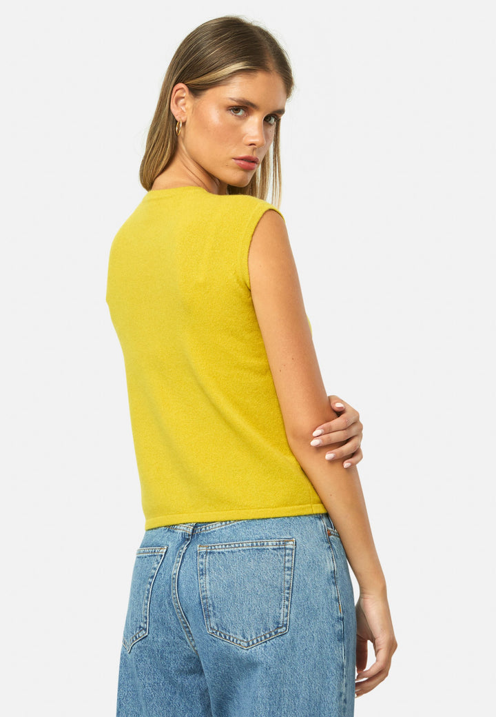 The statement sleeveless knit. Spun from pure cashmere with a cloud-soft handle, it has a neat crew neckline, clean armholes and a waist-skimming straight fit. Lightweight yet warm, it slips under blazers or wears solo with high-rise denim.