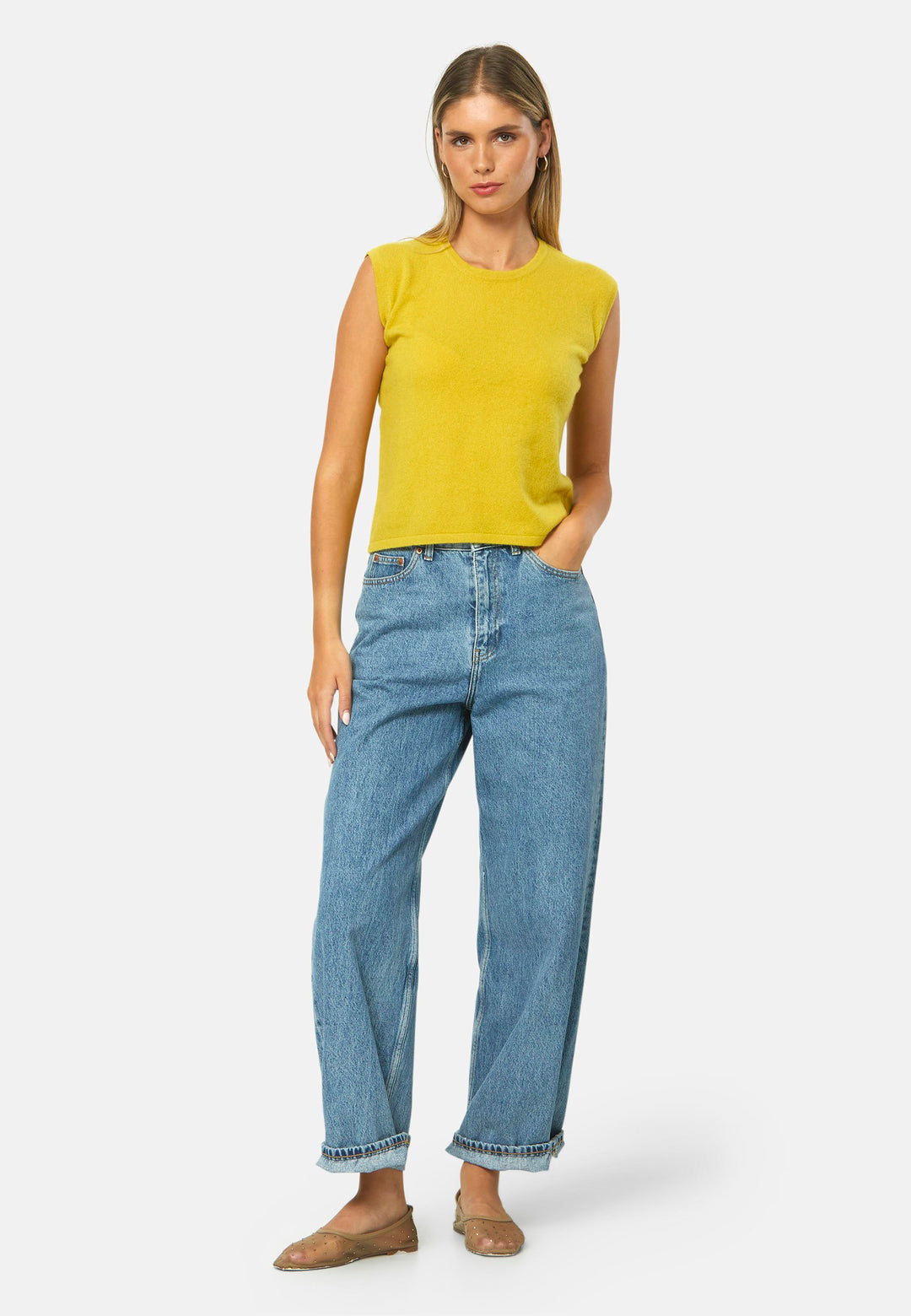 The statement sleeveless knit. Spun from pure cashmere with a cloud-soft handle, it has a neat crew neckline, clean armholes and a waist-skimming straight fit. Lightweight yet warm, it slips under blazers or wears solo with high-rise denim.