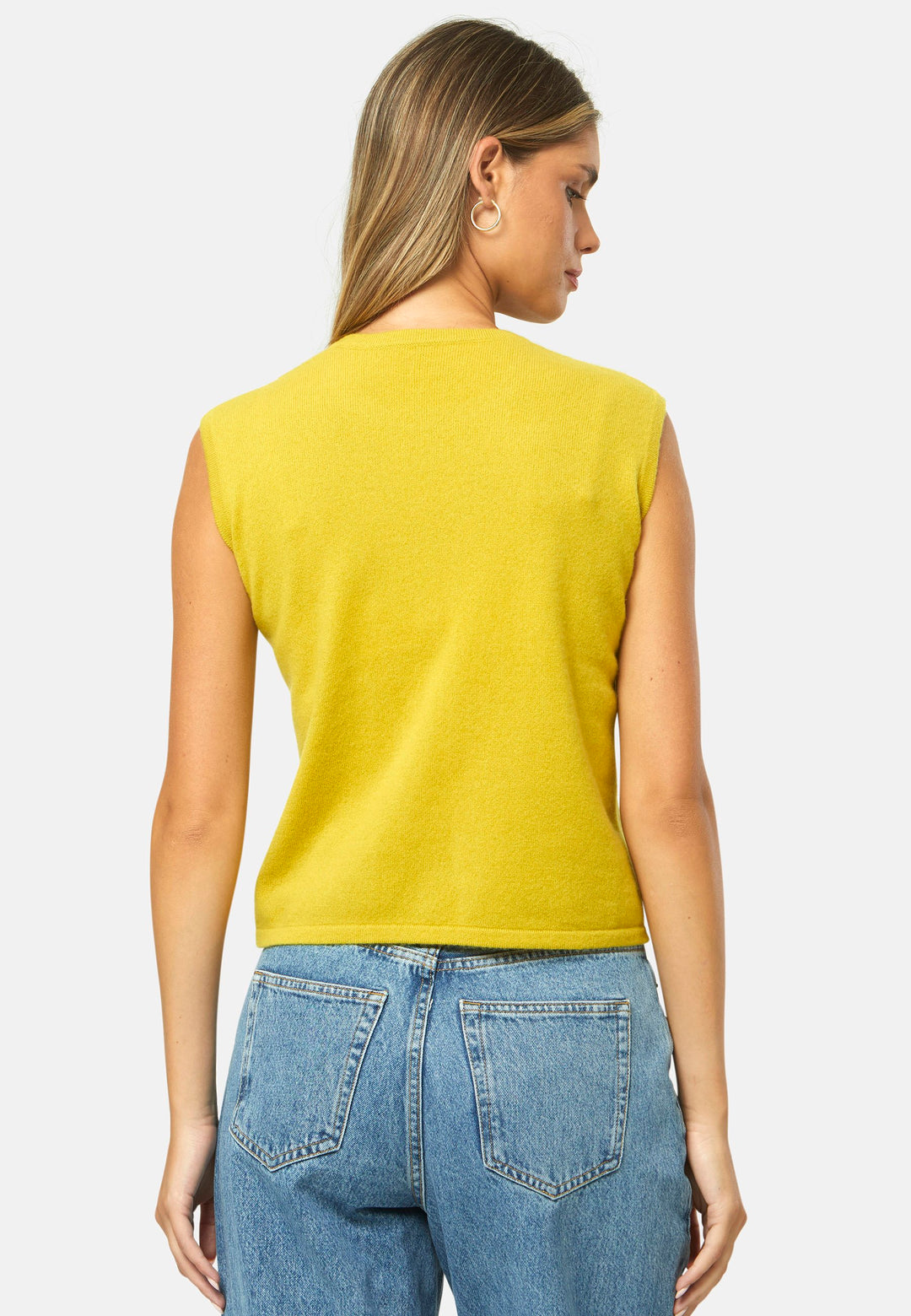 The statement sleeveless knit. Spun from pure cashmere with a cloud-soft handle, it has a neat crew neckline, clean armholes and a waist-skimming straight fit. Lightweight yet warm, it slips under blazers or wears solo with high-rise denim.