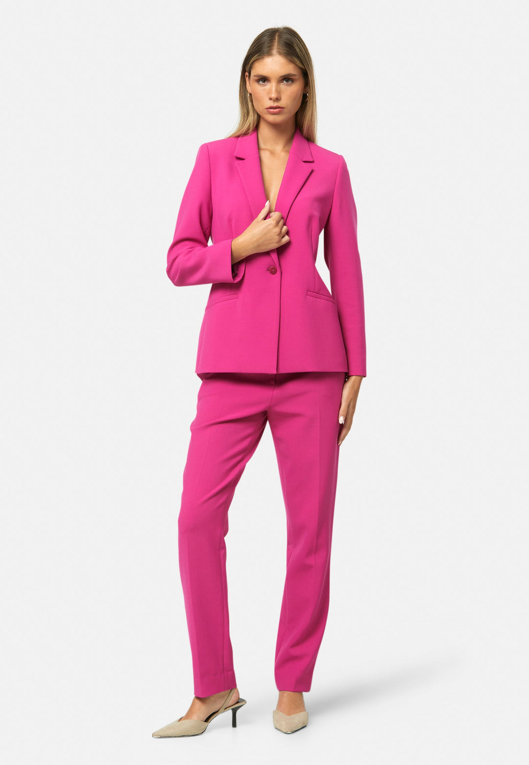 woman wearing pink suit