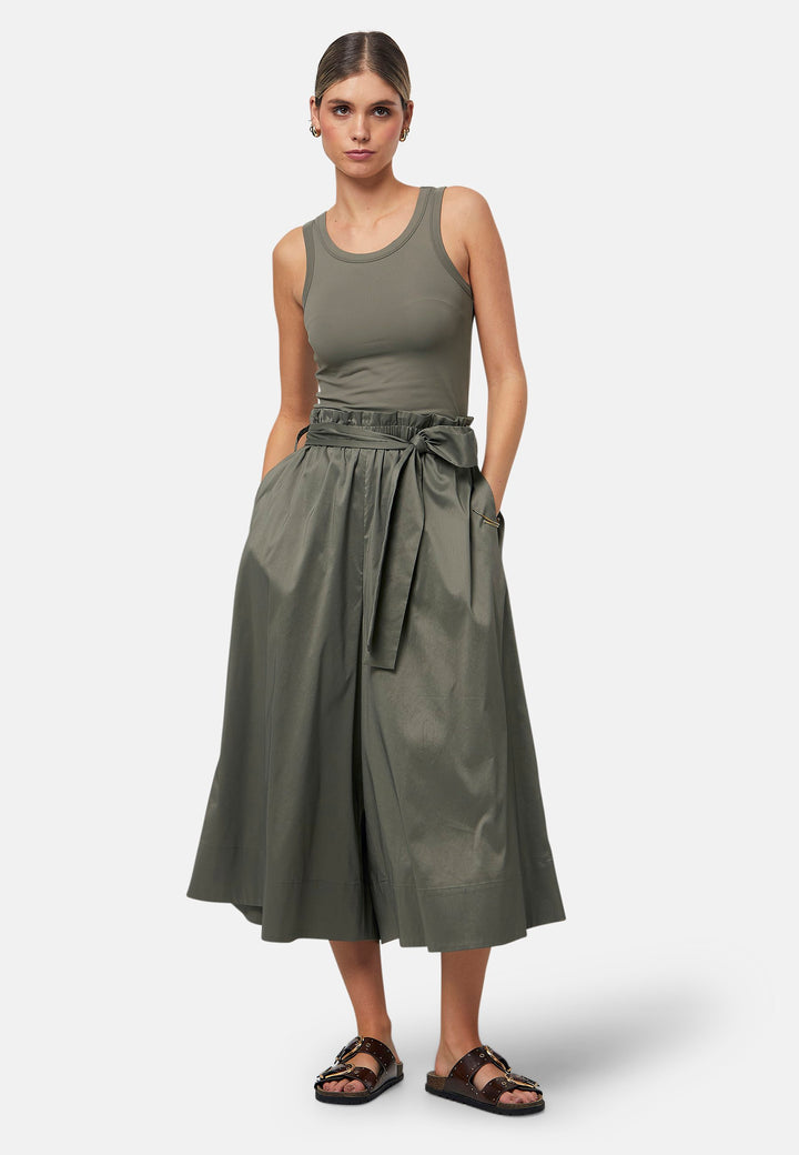 Choose the Meg Olive Culottes. An easy-fitting wide leg, pull-on linen pant that embrace laid-back spirit. A piece you can't travel without. Designed to sit on the high waist for a flattering fit. Features a detachable belt. Paper bag elasticated waist for all day comfort. Cut from a breathable cotton blend. Pair it with a simple tee and the tonal Cassie boyfriend-blazer with trainers for a chic and contemporary look.