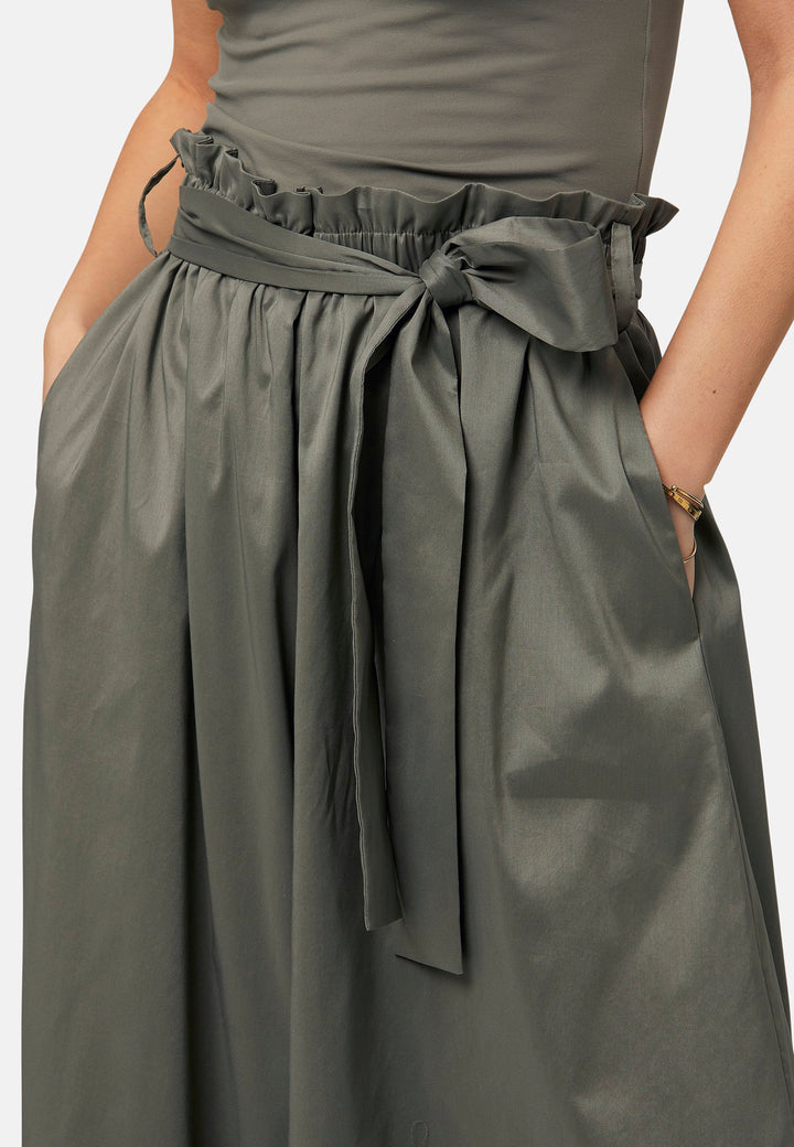 Choose the Meg Olive Culottes. An easy-fitting wide leg, pull-on linen pant that embrace laid-back spirit. A piece you can't travel without. Designed to sit on the high waist for a flattering fit. Features a detachable belt. Paper bag elasticated waist for all day comfort. Cut from a breathable cotton blend. Pair it with a simple tee and the tonal Cassie boyfriend-blazer with trainers for a chic and contemporary look.