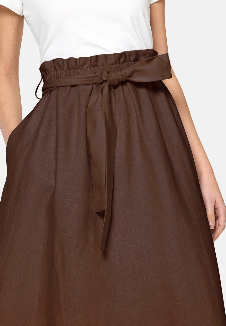 Meg, an easy-fitting, pull-on linen skirt that embraces a laid-back spirit. A piece you can't travel without. Designed to sit on the high waist for a flattering fit. Features a detachable belt. Paper bag elasticated waist for all day comfort. Cut from a breathable Irish linen. Pair it with a simple tee and the co-ordinating Cassie boyfriend blazer with trainers for a chic and contemporary look.