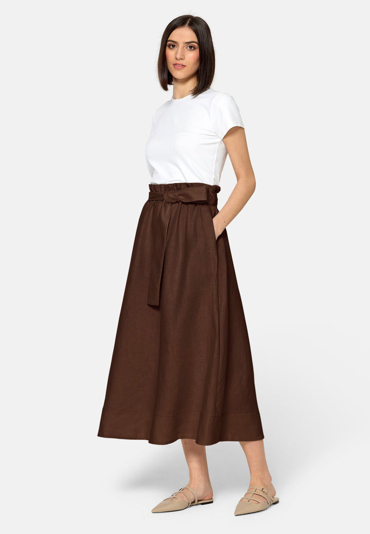 Meg, an easy-fitting, pull-on linen skirt that embraces a laid-back spirit. A piece you can't travel without. Designed to sit on the high waist for a flattering fit. Features a detachable belt. Paper bag elasticated waist for all day comfort. Cut from a breathable Irish linen. Pair it with a simple tee and the co-ordinating Cassie boyfriend blazer with trainers for a chic and contemporary look.