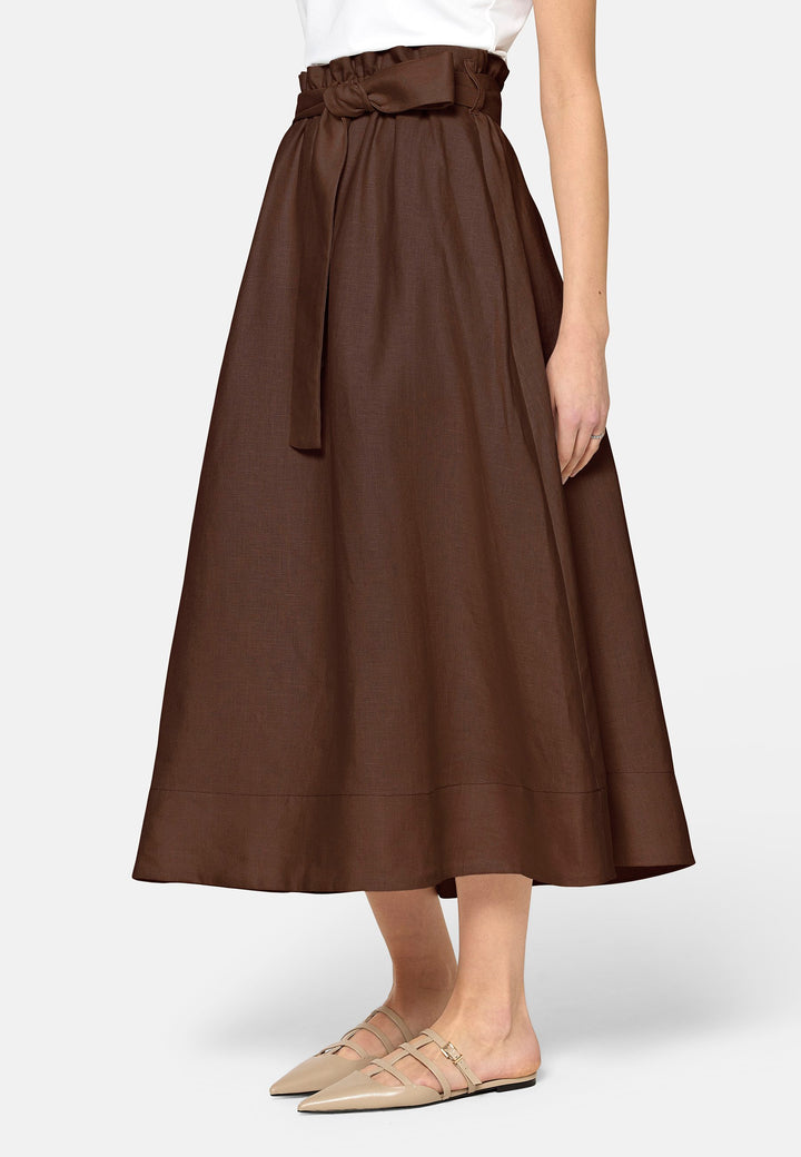 Meg, an easy-fitting, pull-on linen skirt that embraces a laid-back spirit. A piece you can't travel without. Designed to sit on the high waist for a flattering fit. Features a detachable belt. Paper bag elasticated waist for all day comfort. Cut from a breathable Irish linen. Pair it with a simple tee and the co-ordinating Cassie boyfriend blazer with trainers for a chic and contemporary look.