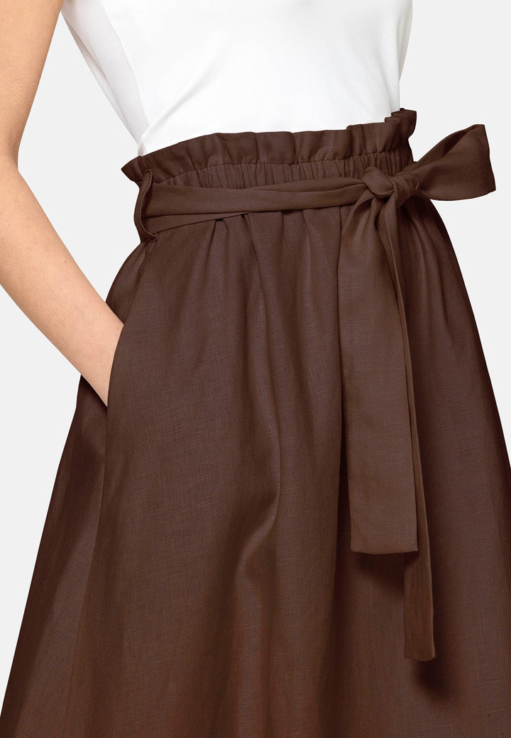 Meg, an easy-fitting, pull-on linen skirt that embraces a laid-back spirit. A piece you can't travel without. Designed to sit on the high waist for a flattering fit. Features a detachable belt. Paper bag elasticated waist for all day comfort. Cut from a breathable Irish linen. Pair it with a simple tee and the co-ordinating Cassie boyfriend blazer with trainers for a chic and contemporary look.