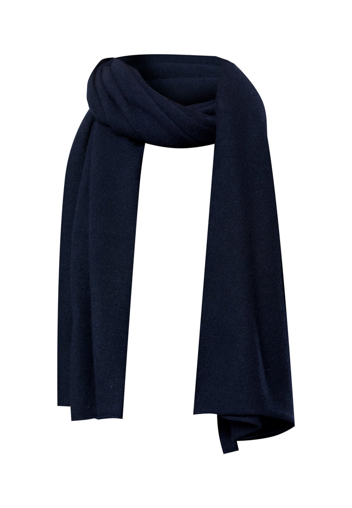 Knitted in pure cashmere with a soft handle, this generously cut wrap drapes fluidly. Loop, wrap or wear as a shoulder cover-up. An effortless layer for denim days and casual outings. In timeless navy, it works layered over tailoring or styled with coordinating knitwear.