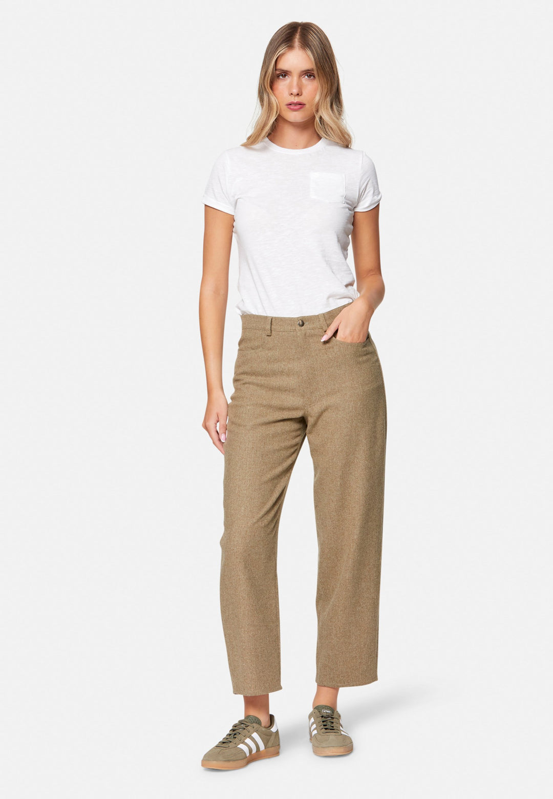 woman wearing white t-shirt and wool brown trouser