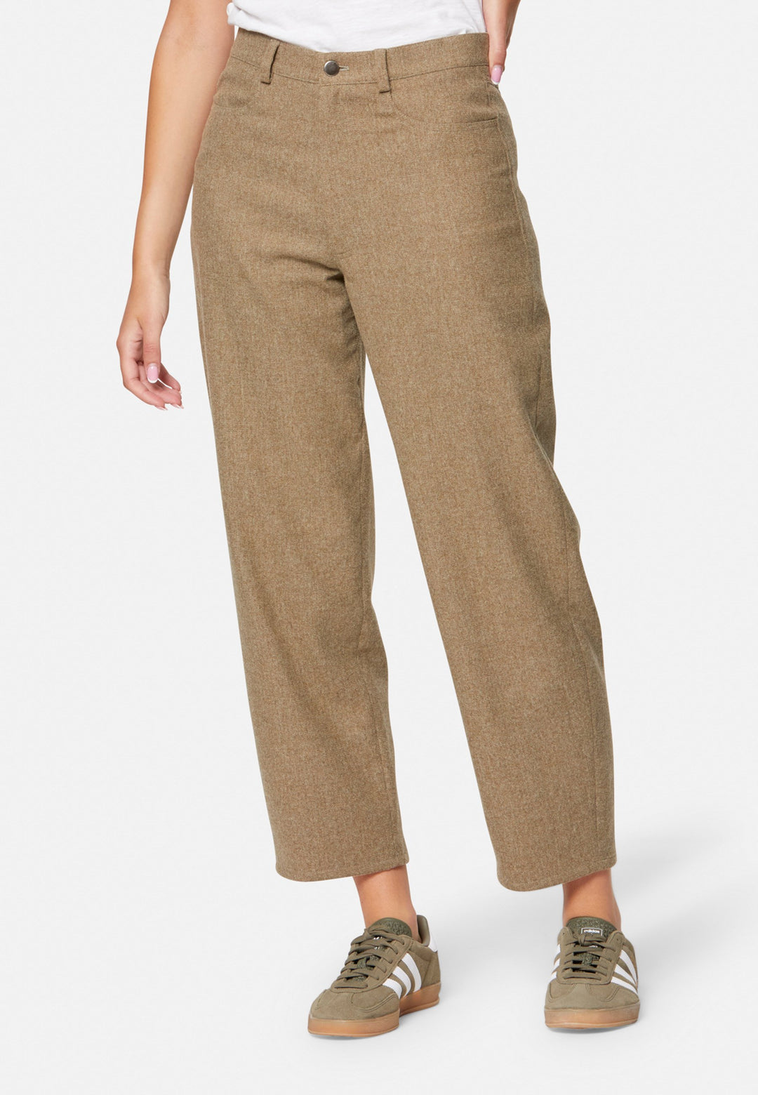 woman wearing white t-shirt and wool brown trouser