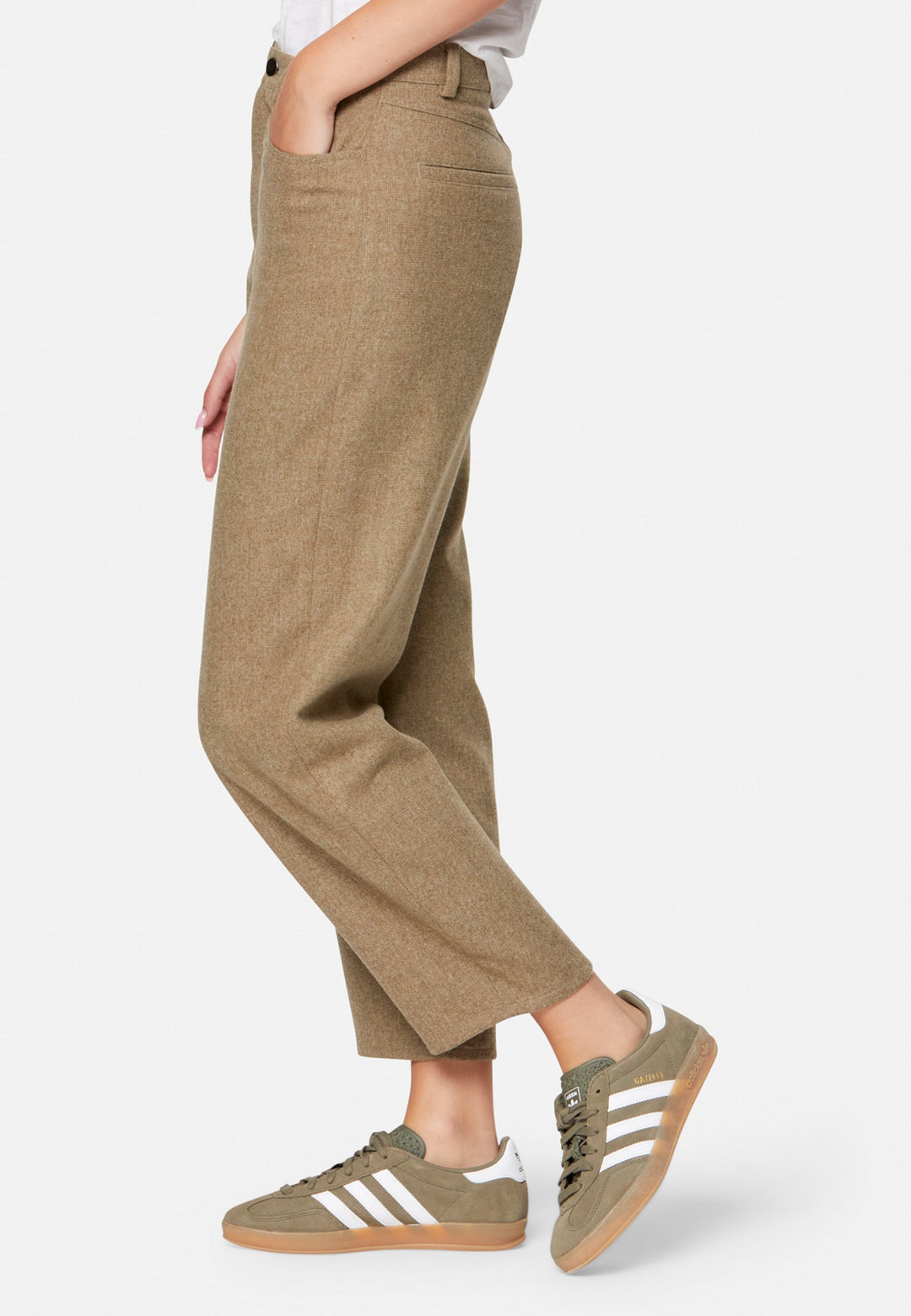 woman wearing white t-shirt and wool brown trouser