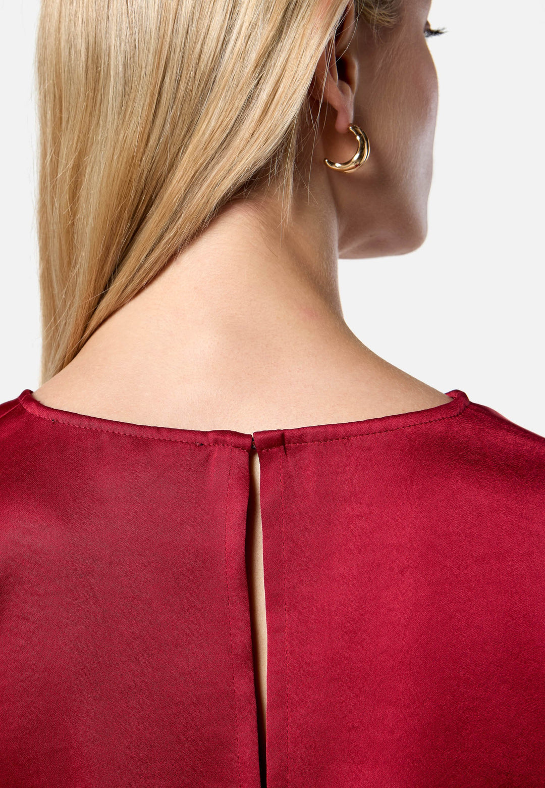 model wearing Nicki Ruby Red Satin Top