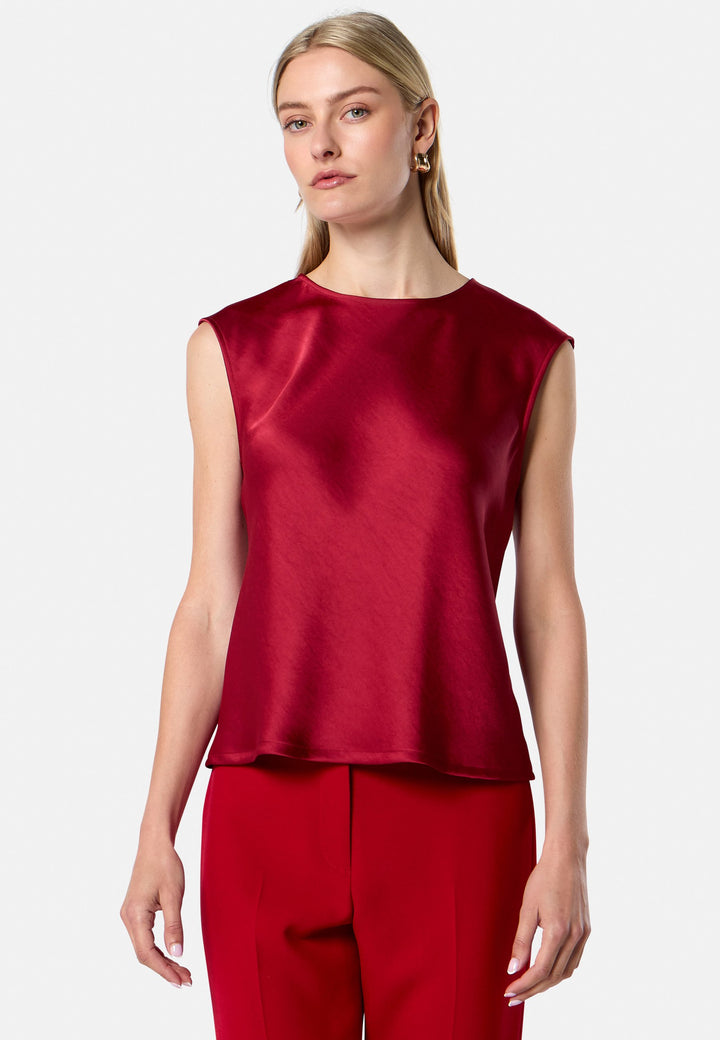 model wearing Nicki Ruby Red Satin Top
