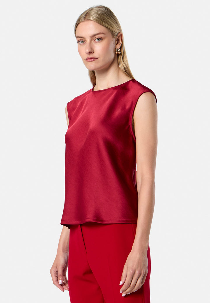 model wearing Nicki Ruby Red Satin Top