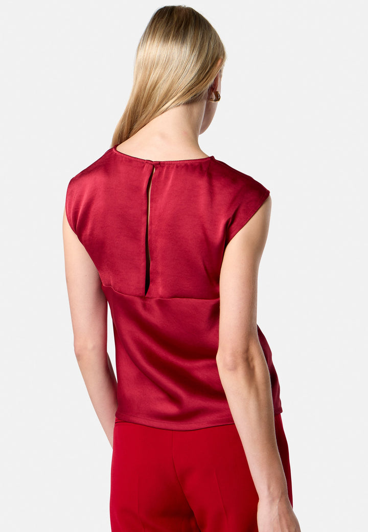 model wearing Nicki Ruby Red Satin Top