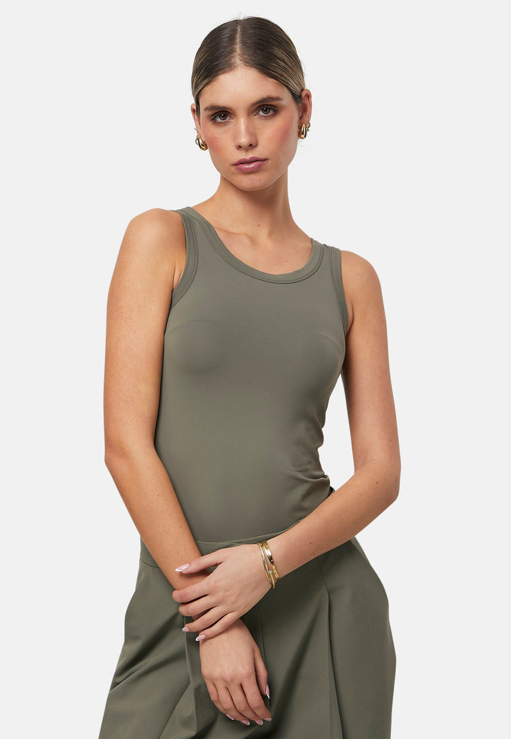 Hit refresh on your everyday essentials with the olive Norah tank Top. Crafted in a luxe stretch jersey. Features round neckline and muscle back silhouette.
