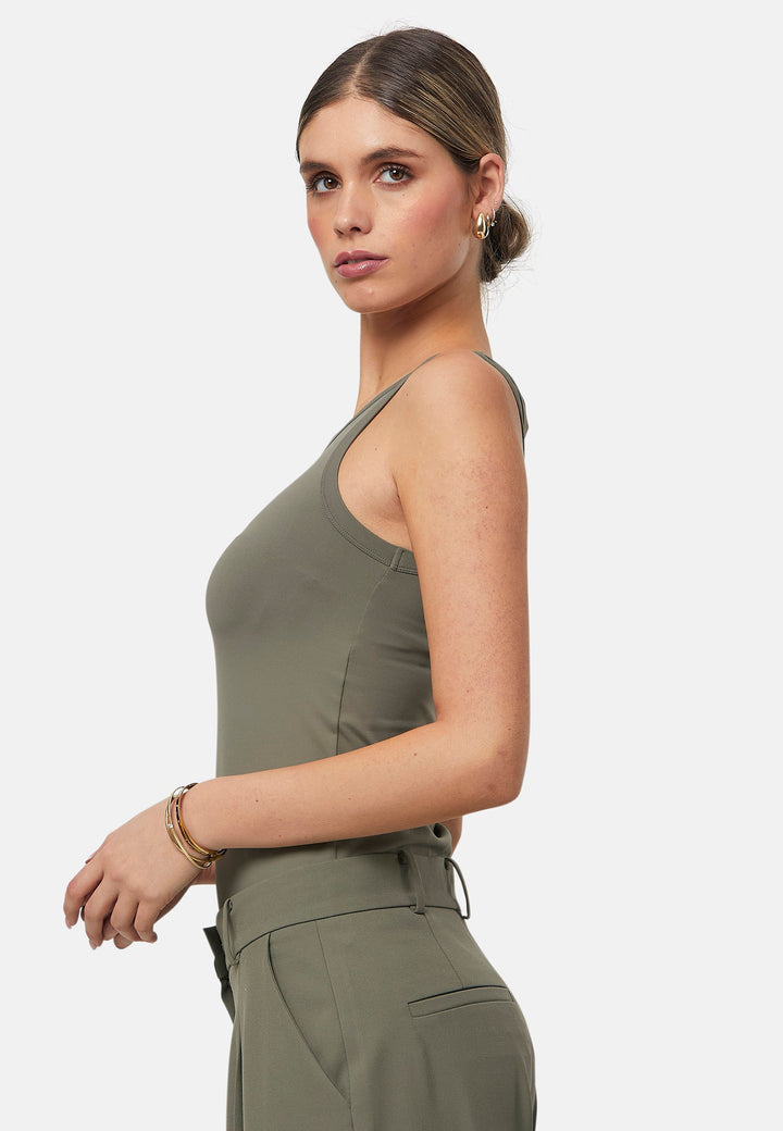 Hit refresh on your everyday essentials with the olive Norah tank Top. Crafted in a luxe stretch jersey. Features round neckline and muscle back silhouette.