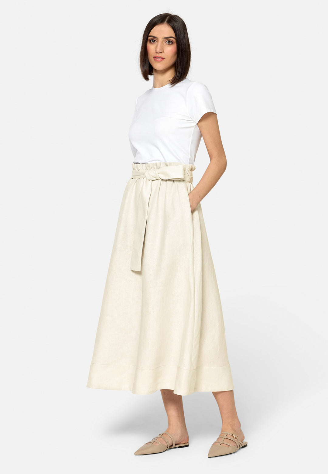Meg, an easy-fitting, pull-on linen skirt that embraces a laid-back spirit. A piece you can't travel without. Designed to sit on the high waist for a flattering fit. Features a detachable belt. Paper bag elasticated waist for all day comfort. Cut from a breathable Irish linen. Pair it with a simple tee and the co-ordinating Cassie boyfriend-blazer with trainers for a chic and contemporary look.
