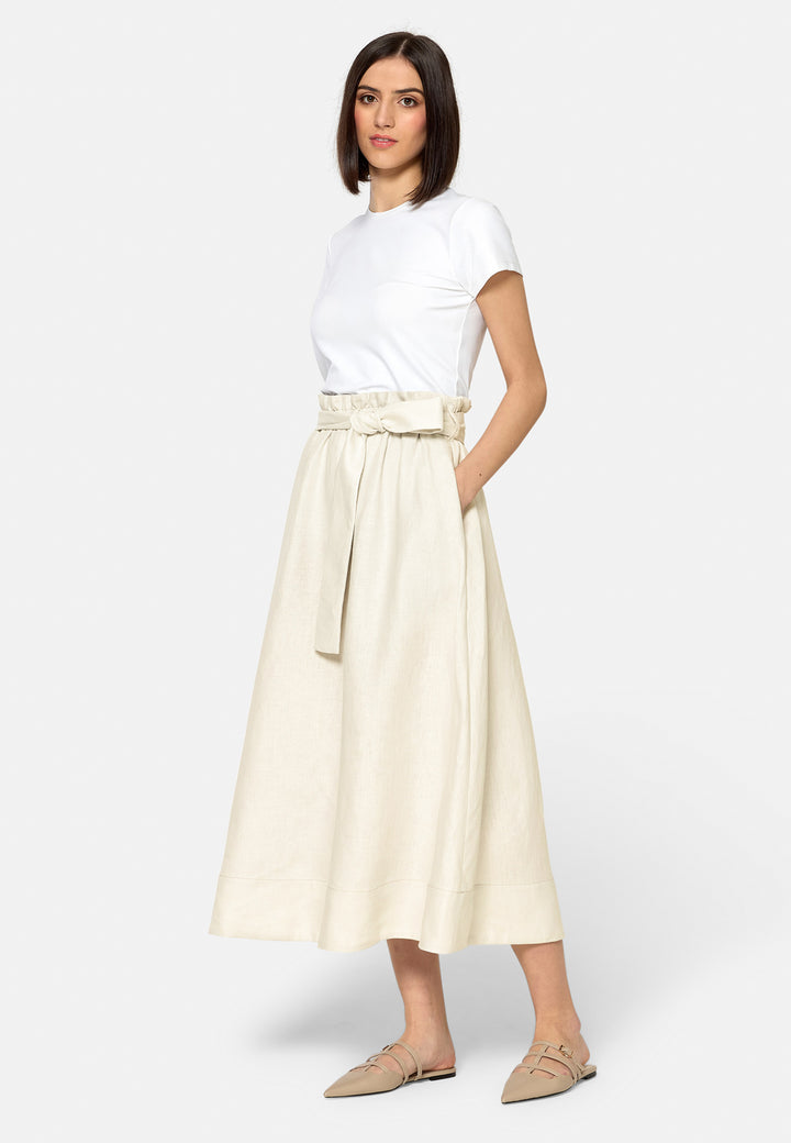 Meg, an easy-fitting, pull-on linen skirt that embraces a laid-back spirit. A piece you can't travel without. Designed to sit on the high waist for a flattering fit. Features a detachable belt. Paper bag elasticated waist for all day comfort. Cut from a breathable Irish linen. Pair it with a simple tee and the co-ordinating Cassie boyfriend-blazer with trainers for a chic and contemporary look.