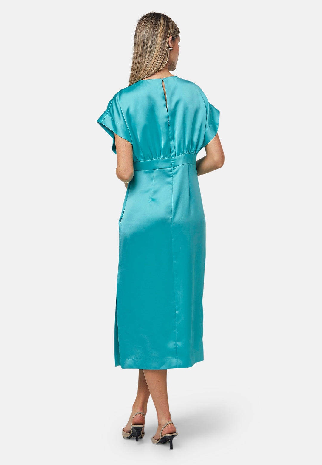 Elevate your wardrobe with the Shiv dress, a simple aqua midi dress in satin. Featuring dropped sleeves, a gathered back waist seam, and a side slit for ease of movement. The back has a keyhole detail with a button closure. Perfect for a summer wedding or afternoon luncheons.