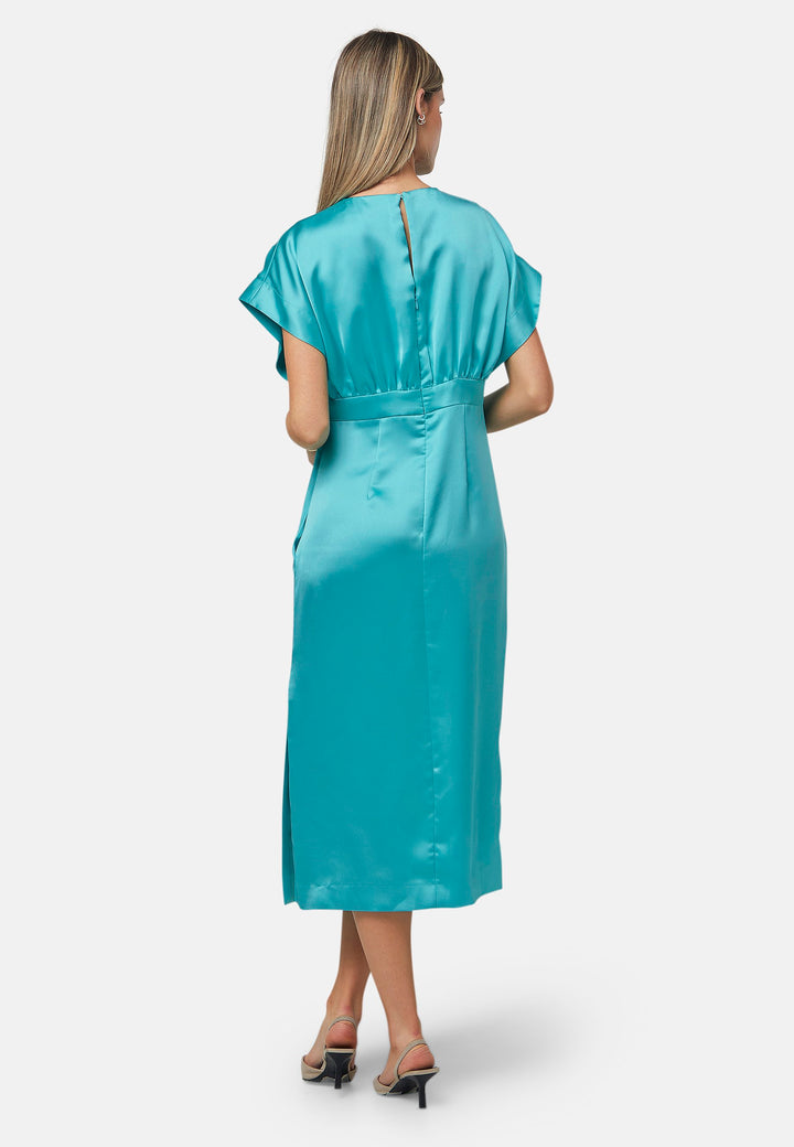 Elevate your wardrobe with the Shiv dress, a simple aqua midi dress in satin. Featuring dropped sleeves, a gathered back waist seam, and a side slit for ease of movement. The back has a keyhole detail with a button closure. Perfect for a summer wedding or afternoon luncheons.