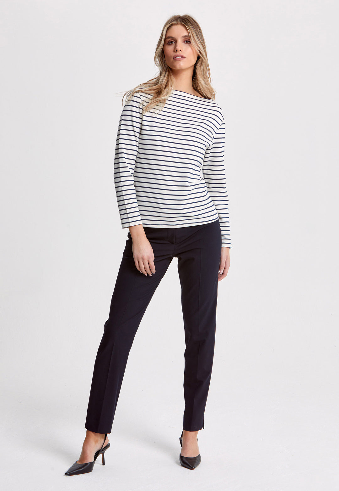 Experience the timeless elegance of our Teagan Stripe Top, expertly crafted with a luxurious stretch jersey and complemented by a sleek round neck. Available in both ecru and navy stripe, it's a must-have essential for any sophisticated wardrobe.