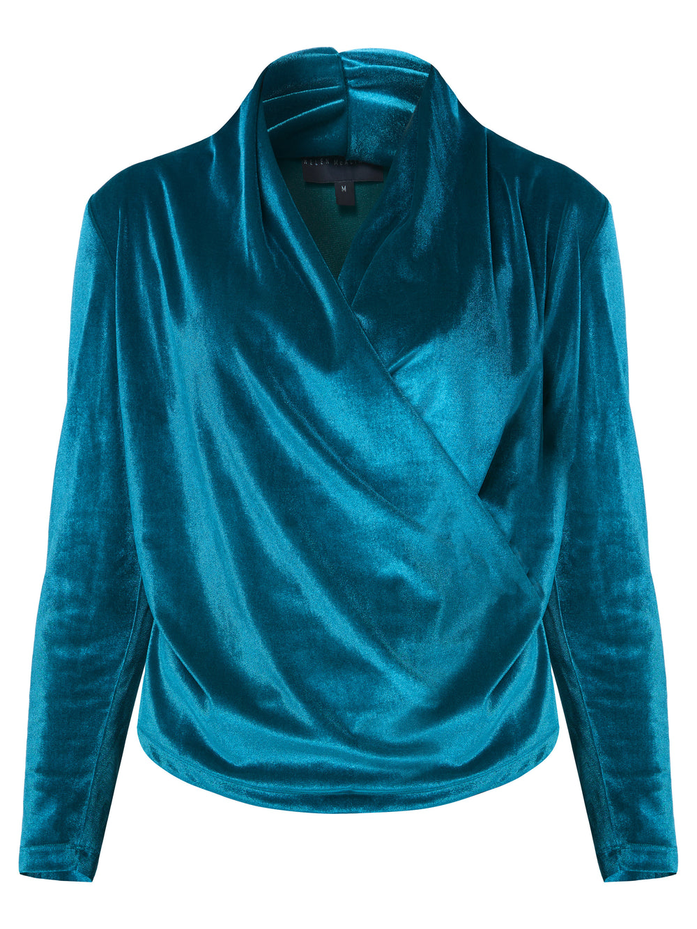 Introducing the Roxanne Petrol Top, an updated version of the beloved best-selling faux-wrap top. This stunning top showcases a sleek silhouette with a gracefully draped v-neckline, creating an air of elegance. Crafted from luxurious stretch velvet in a rich teal tone, it emanates sophistication and allure. The hip-length cut and full-length sleeves offer both comfort and style. Elevate your fashion game with the Roxanne Petrol Top, the epitome of refined chic and a statement piece for any occasion.