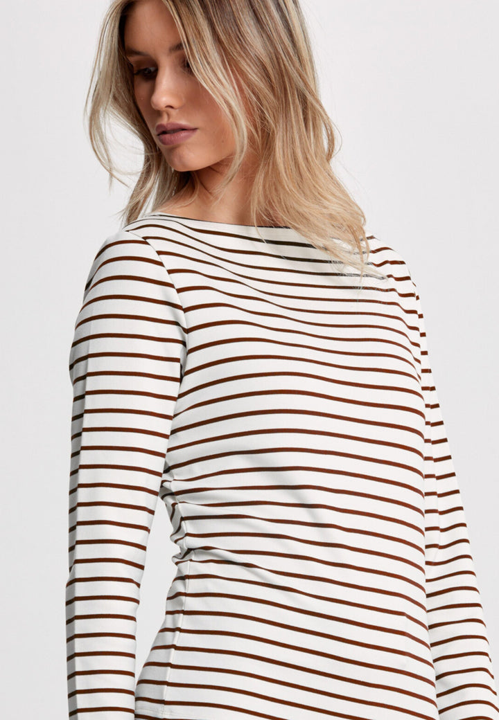The Teagan boat neck top, crafted in a luxe stretch jersey. Features bracelet length sleeve. Now available in a sandlewood and ecru stripe.
