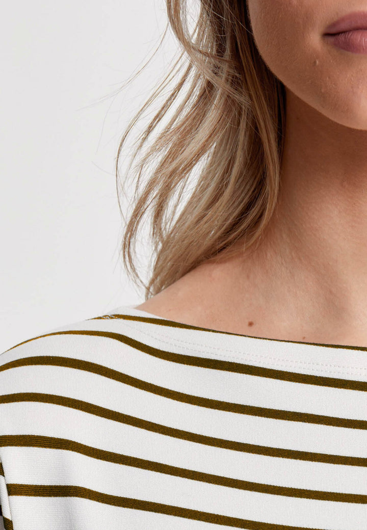 The Teagan boat neck top, crafted in a luxe stretch jersey. Features bracelet length sleeve. Now available in a sandlewood and ecru stripe.