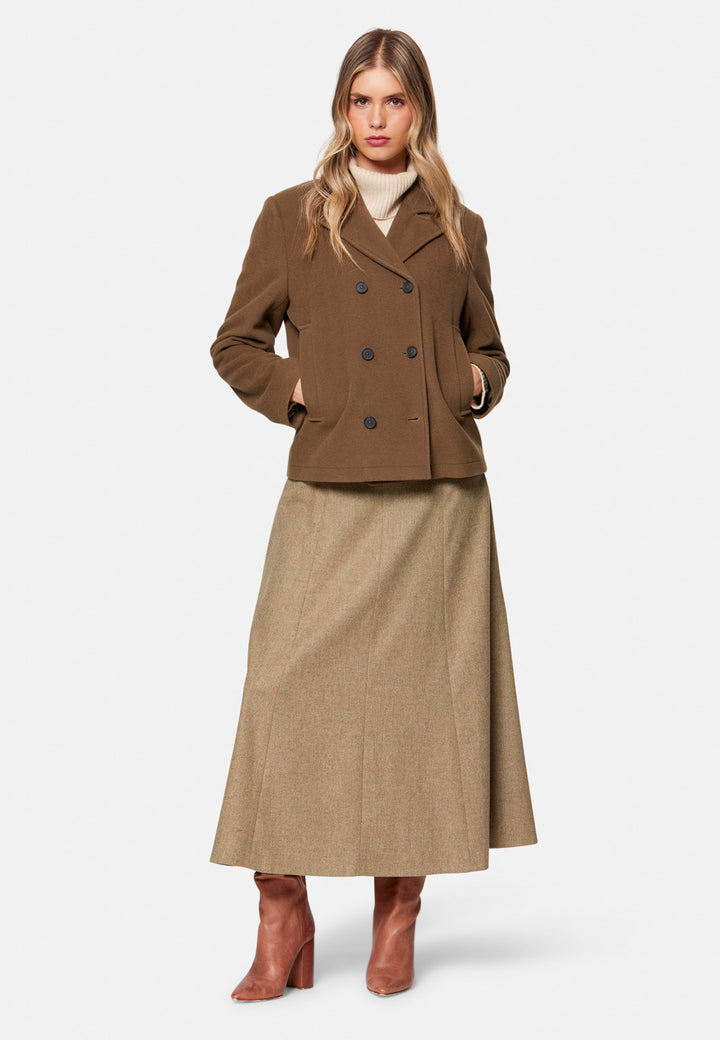 women wearing wool beige long skirt